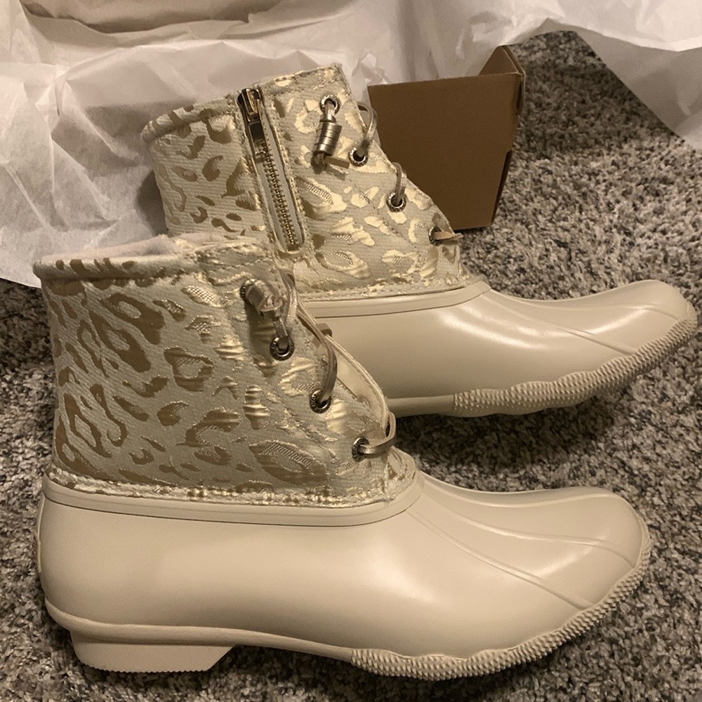 Sperry boots NWT and still in box. Cheetah ivory.
